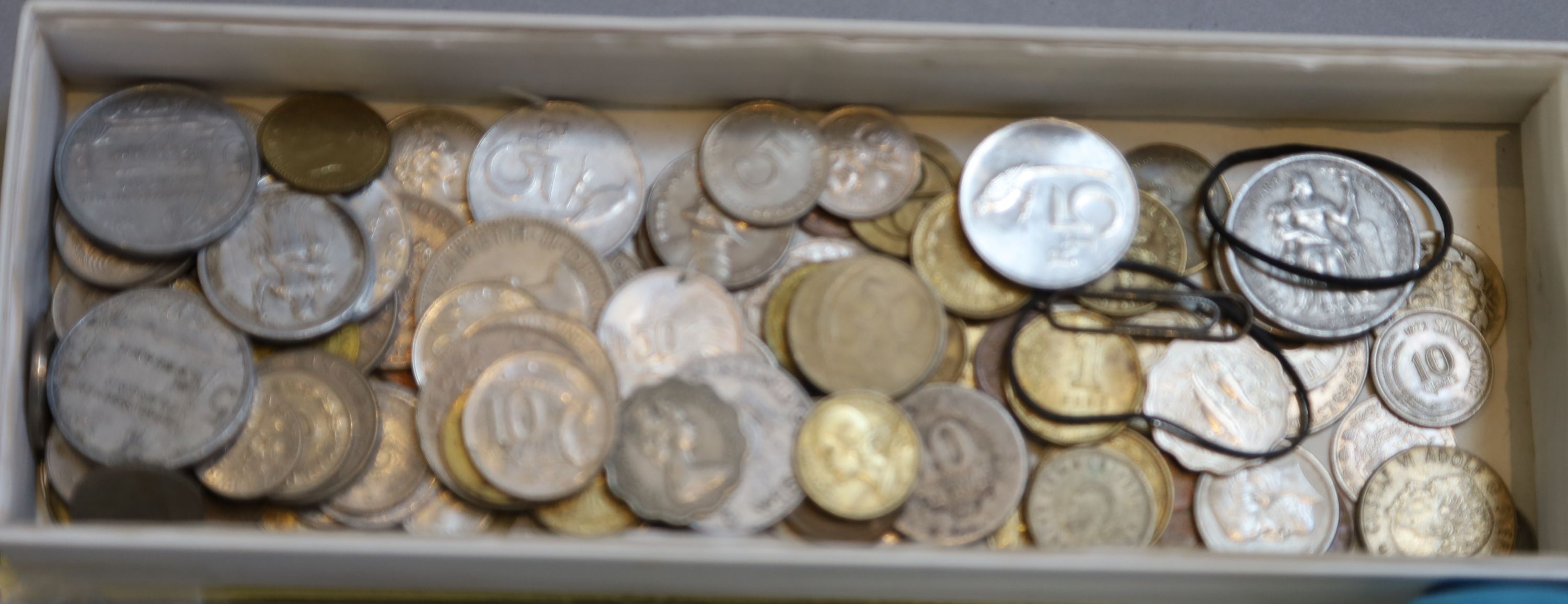 A collection of assorted coins and medallions